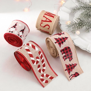 Christmas burlap ribbon rolls with festive Santa reindeer prints and red stitched edges