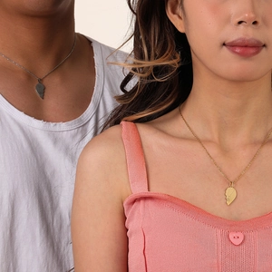 Minimalist heart puzzle couple necklaces in gold and silver finish on models