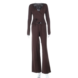 Detail of dark brown knit set with V-neck long sleeve top and wide-leg trousers