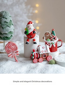Festive Christmas decor set featuring Santa bell, gingerbread train, and holiday mugs