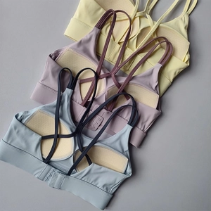 High-impact sports bras with cross-back straps and breathable pads in three colors