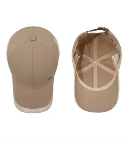 Detailed top view of khaki mesh baseball cap showing breathable holes and inner label