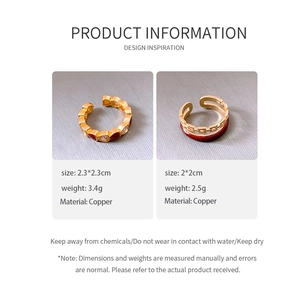 Macro view of gold-plated double-layer chain rings with red enamel details and specs