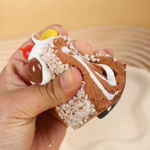 Realistic chocolate Swiss roll squishy toy made of soft PU foam for stress relief