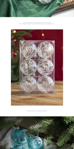 Detailed close-up of transparent acrylic Christmas balls with reindeer and snowflake prints