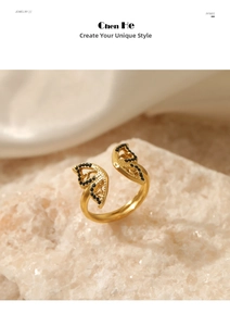 Macro detail of gold adjustable butterfly ring with black pave stones on stone base