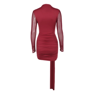 Detail of burgundy bodycon dress featuring elegant mesh sleeves and ruched fabric design