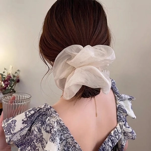 Elegant white oversized organza hair scrunchie with pearlescent finish for ponytail