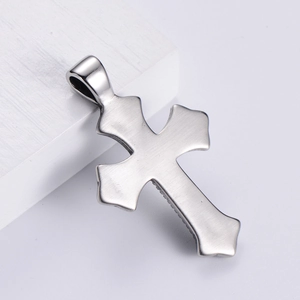 Classic silver punk cross pendant with brushed stainless steel finish on a white stand