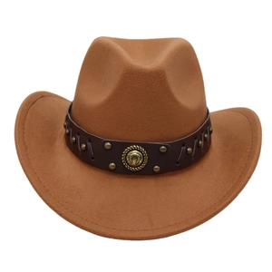 Detailed view of a brown felt cowboy hat with leather band and horseshoe emblem