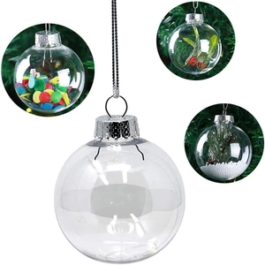 Close-up of clear fillable Christmas ornaments showing colorful confetti and snow filling