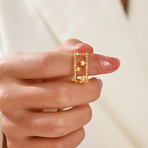 Double layer 18K gold plated stainless steel star ring with beaded edges on model