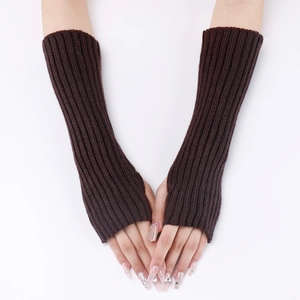 Detailed knit texture and striped pattern of dark brown fingerless arm warmers