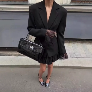 Fashionable black blazer jacket with lace splicing and matching accessories in street style