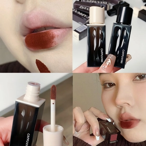 Detail of Cappuvini velvet matte lip glaze showing brush tip and reddish brown lip shade