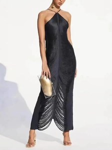 Elegant black halter neck long dress with vertical tassels and a glossy silk finish