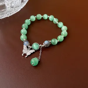 Bracelet élégant en perles d'oeil de chat avec pendentif papillon en zircon pour femme