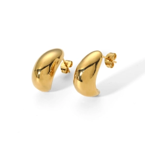 Symmetric pair of 18k gold-plated C-shape bean stud earrings on a white background