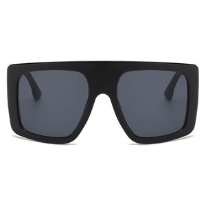 Oversized flat top black sunglasses with thick frames and integrated dark lenses