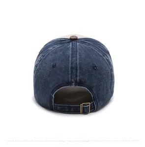 Rear view of washed denim baseball cap featuring retro bronze adjustable metal buckle