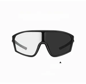 Detail of black sports sunglasses showing clear to dark photochromic lens transition