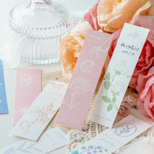 Floral letterpress bookmarks set featuring botanical designs on specialty paper textures