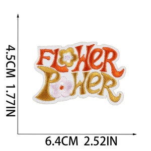 Detail view of Flower Power sun embroidery patch with 6.4cm by 4.5cm dimensions