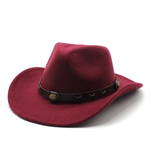 Detail of burgundy western cowboy hat featuring leather band with metallic rivets