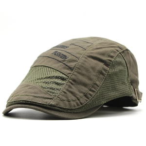 Detail of army green mesh beret showing breathable fabric and classic embroidery