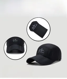 Detail of foldable sun hat showing UPF 50+ protection and mountain logo in black color