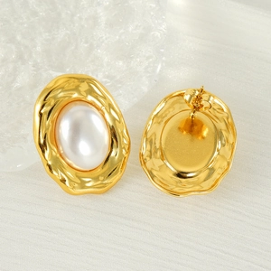 Retro gold plated irregular oval earrings with white pearl and hammered metal texture