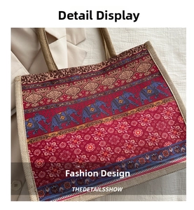 Close-up of red ethnic elephant print on heavy linen tote bag showing fabric texture