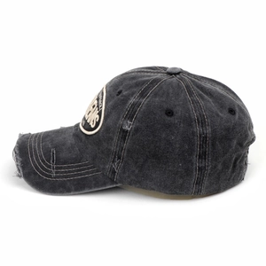 Detail view of black washed cotton baseball cap with rock and roll embroidery patch