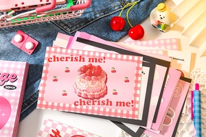 Close-up of vintage pink strawberry cake postcards and stickers 30pcs set
