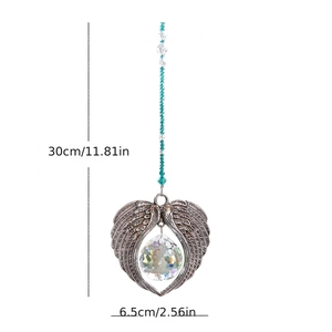Detail view of crystal suncatcher with angel wings showing dimensions 30cm and 6.5cm