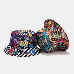 Detail of 80s retro graffiti print on a double-sided bucket hat with vibrant canvas texture