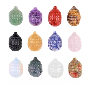 Mini grenade-shaped crystal pendants in natural amethyst and quartz variety set