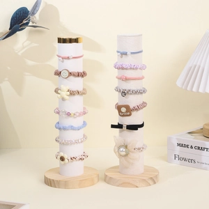 Wooden display stand for hair scrunchies and bracelets with velvet cylinder holders