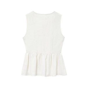 Detailed view of white sleeveless peplum top with textured crepe fabric on white background