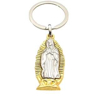 Gold and silver Virgin Mary metal keychain pendant on a clean white background