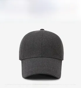 Front detail of charcoal grey winter baseball cap with waffle texture and State embroidery