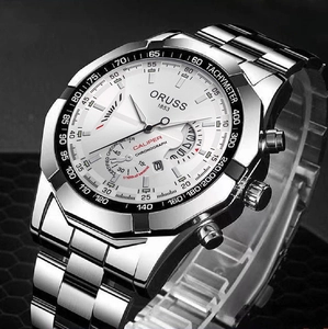 Detail of silver stainless steel chronograph watch with white dial and tachymeter bezel