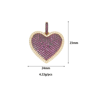 Gold heart pendant with pink and white pavé crystals measuring 23mm by 24mm