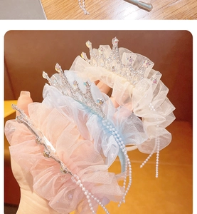 Detailed view of girls princess headbands with mesh lace crowns and pearl tassels