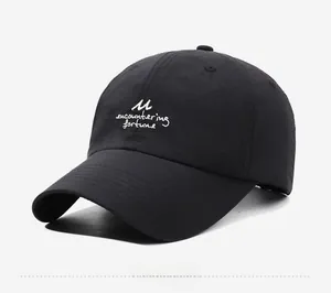 Detail of black quick-dry baseball cap with white encountering fortune embroidery