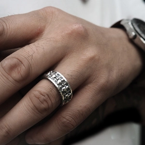 Retro S925 sterling silver skull and cross ring worn by a model in gothic style