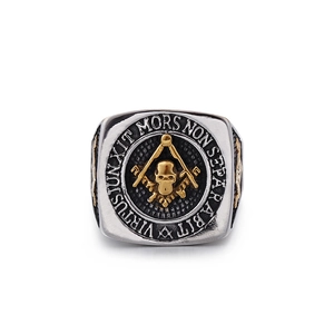 Vintage stainless steel Freemason skull ring with gold accents and Latin engraving