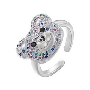 Close-up of a teddy bear ring with colorful pavé crystals and silver finish detail