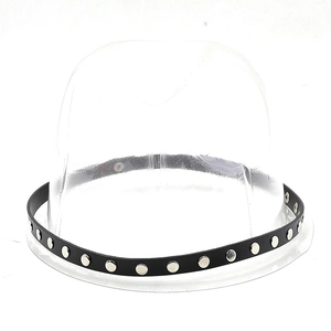 Detail of black leather hat band featuring silver metallic studs on a plastic display stand