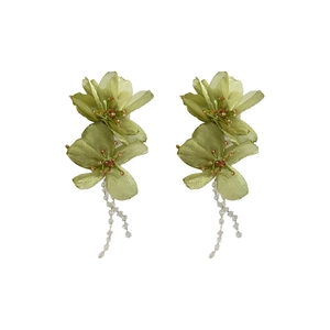 Dramatic green lace flower earrings with crystal fringe tassels on a clean white background